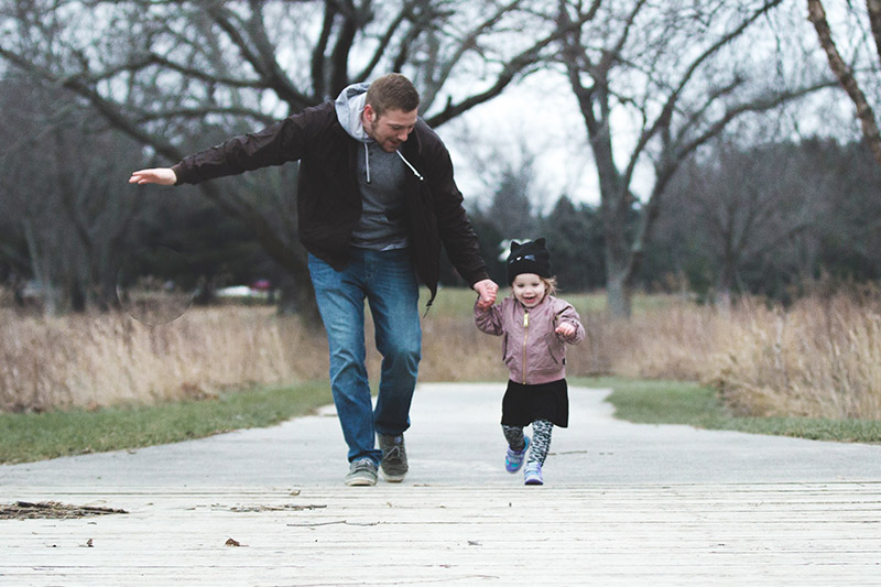 Father and child running